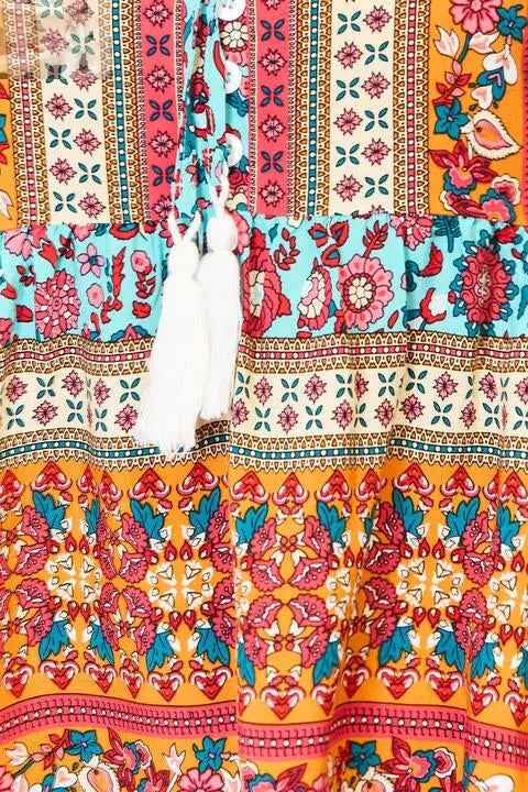 Double Take Bohemian Tassel Puff Sleeve Blouse with Tie and Babydoll Design - MegaSuperStar