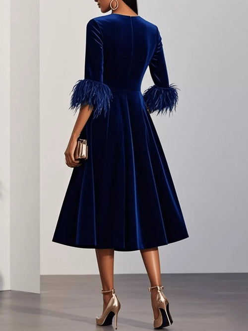 Customer styling Velvet Midi Dress with Feather Cuffs